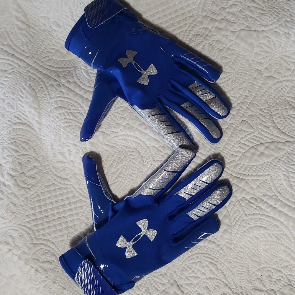Youth medium football gloves unused under amour